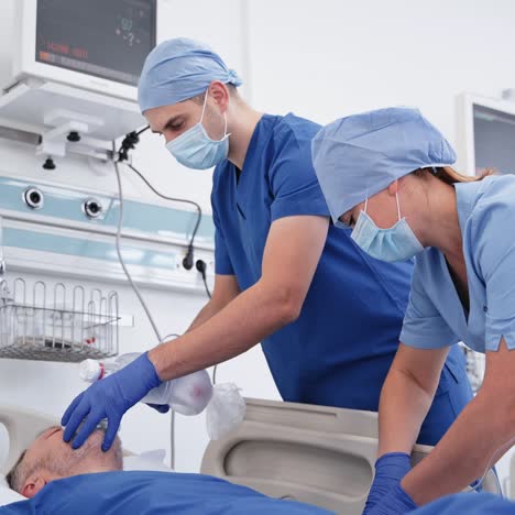 senior patient receiving oxygen mask