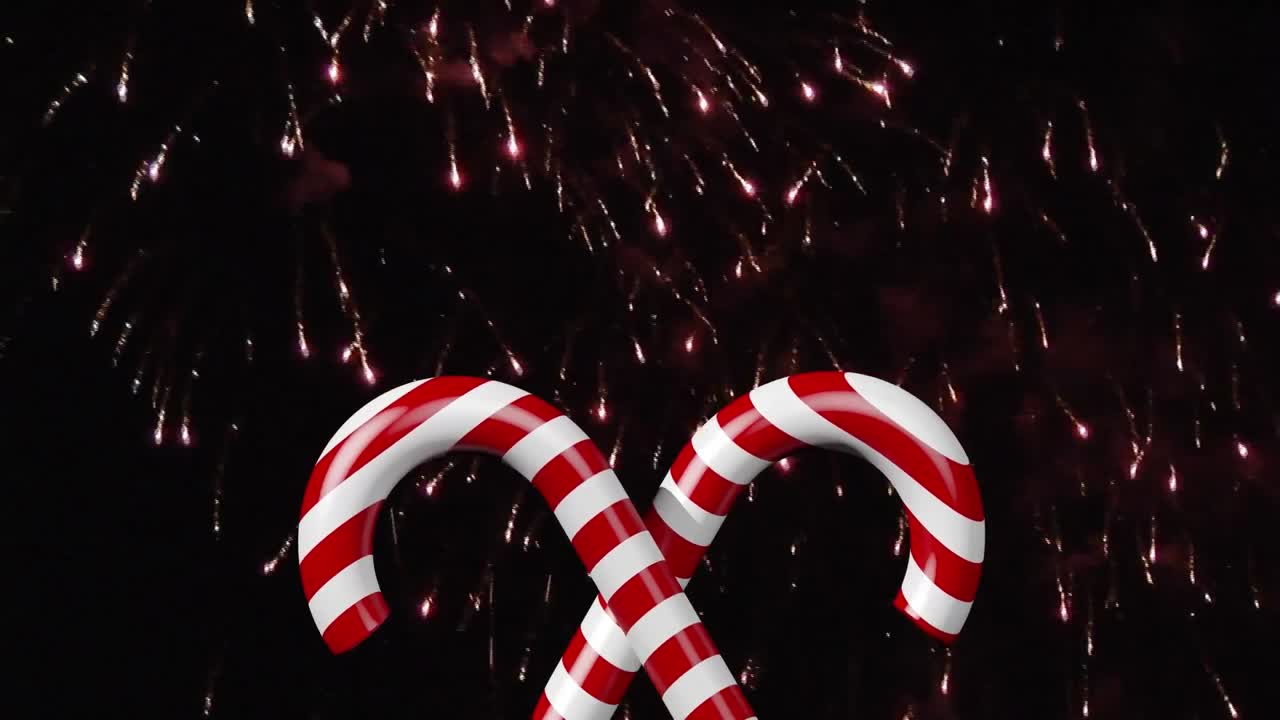 animación de fuegos artificiales sobre dulces de navidad en fondo negro