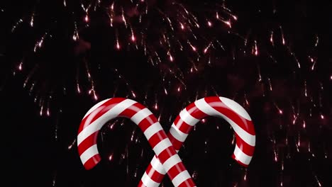 animation of fireworks over christmas candies on black background