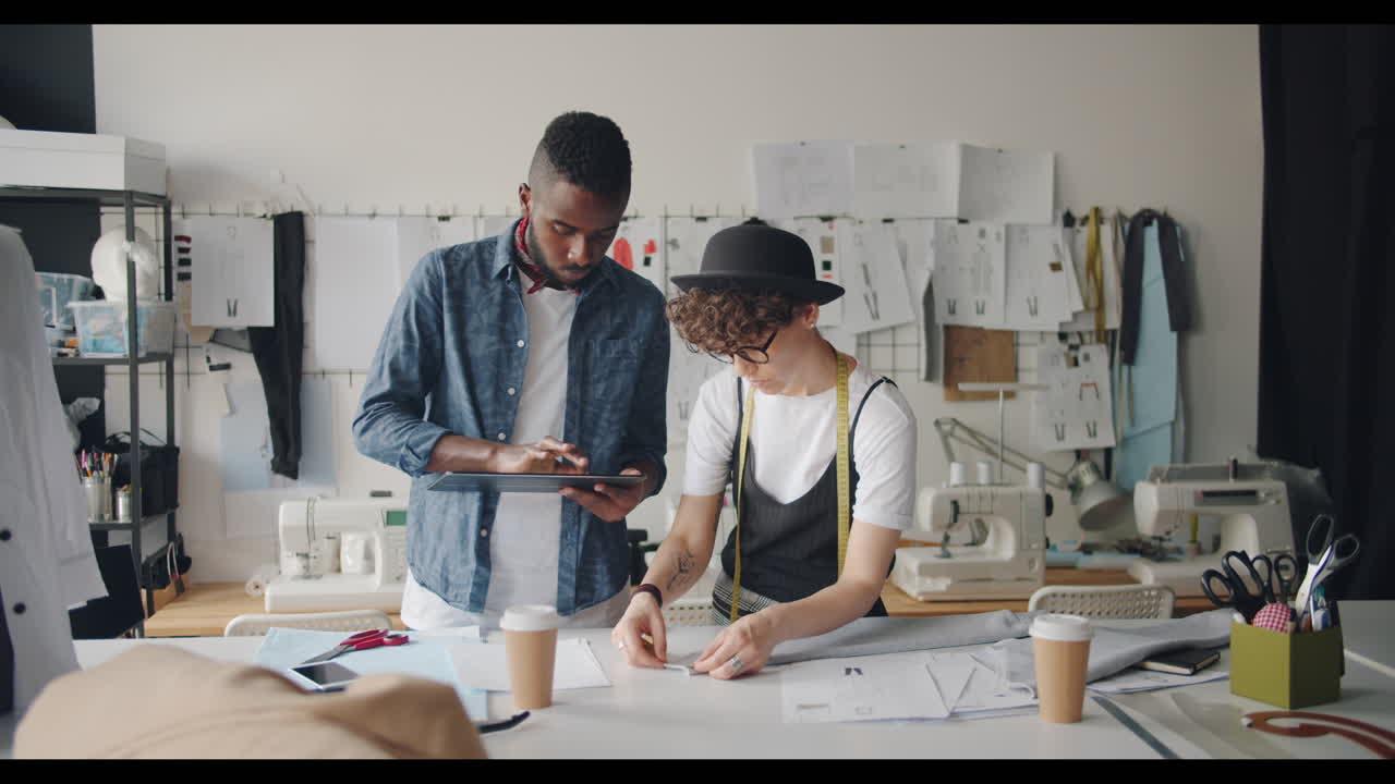 Fashion Designers Working in a Studio