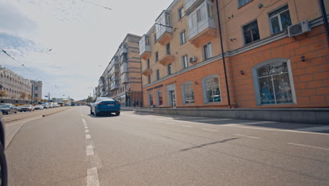 audi in blue color on street. audi e-tron on road during test drive