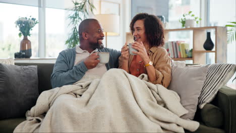 happy couple enjoying a cozy afternoon at home