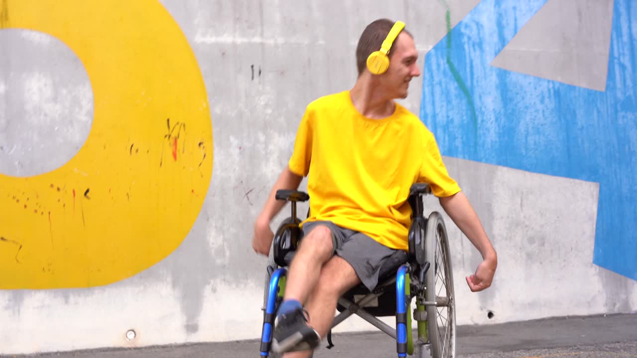 Man in Wheelchair Dancing to Music