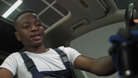 Man Cleaning Car Interior