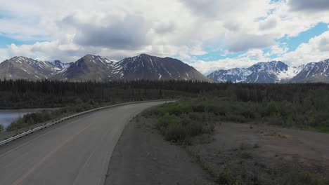 4K-Drone-Video-of-Mountain-Peaks-and-Granite-Creek-near-Denali-National-Park-in-Alaska-on-Sunny-Summer-Day