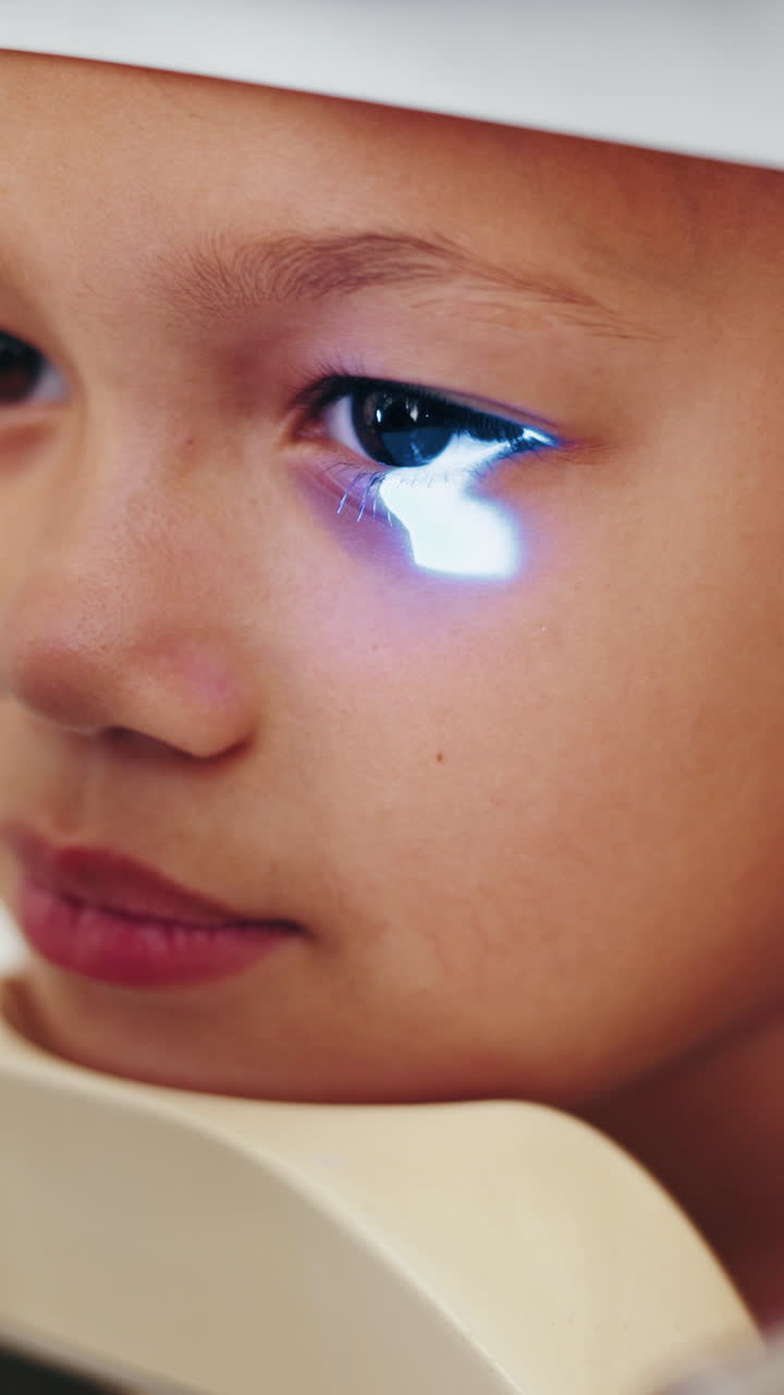 Child undergoing an eye exam