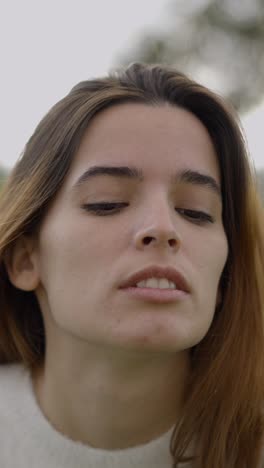 close-up portraits of a young woman outdoors