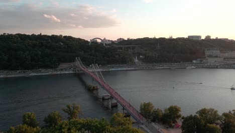 Aerial-view-of-the-Dnipro-river-near-the-city-of-Kiev-with-the-People's-Friendship-Arch-in-the-hill