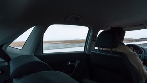 a panning timelapse from the inside of a car during a drive in iceland