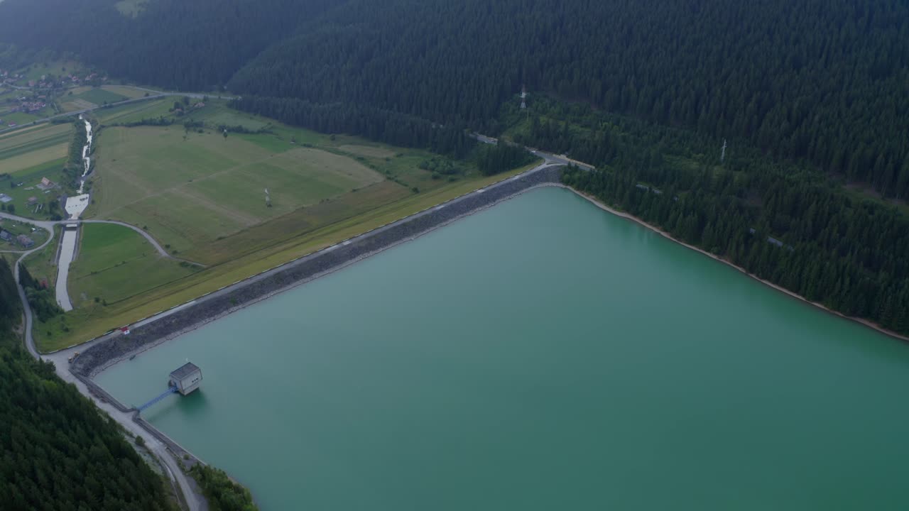 Aerial View of a Reservoir in a Mountainous Region