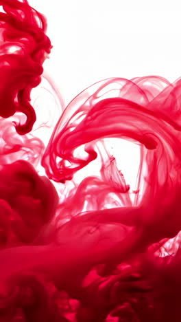 a red smoke trail, which is a symbol of passion and intensity. the red color of the smoke is bold and striking, and it creates a sense of drama and excitement. the smoke trail is long and flowing