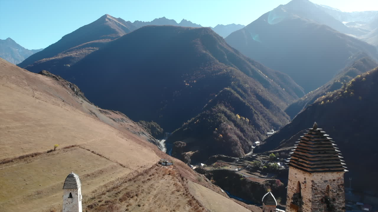 Mountain Valley with Ancient Stone Towers