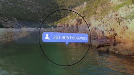 animation of social media icon and rocky shore with sea landscape
