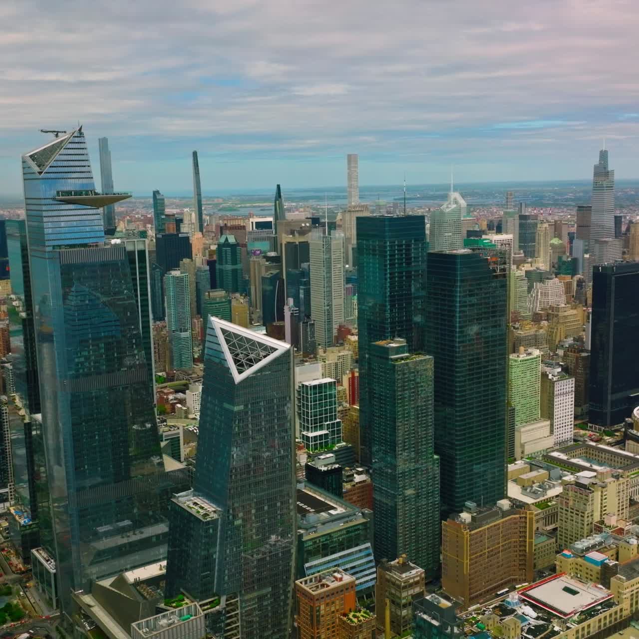 Variety of architecture in New York city. Diverse vibrant metropolis on sunny daytime. Top view