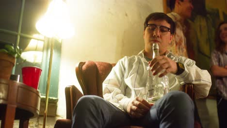 man heaves and runs away to puke at party