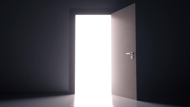 A Door Slowly Opens Revealing Bright White Light