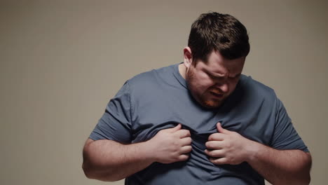 man experiencing chest pain