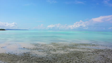 fly over of beach and turquoise sea in madagascar