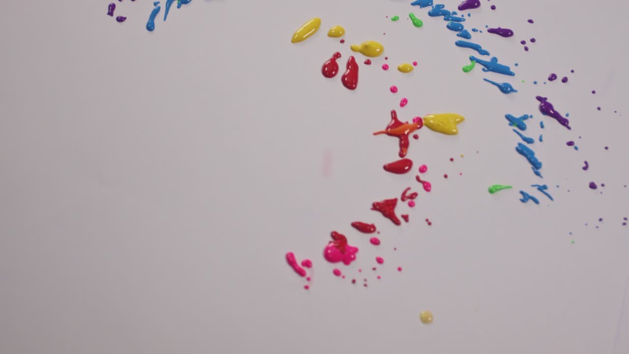 Colors began to drop onto the spinning white background.