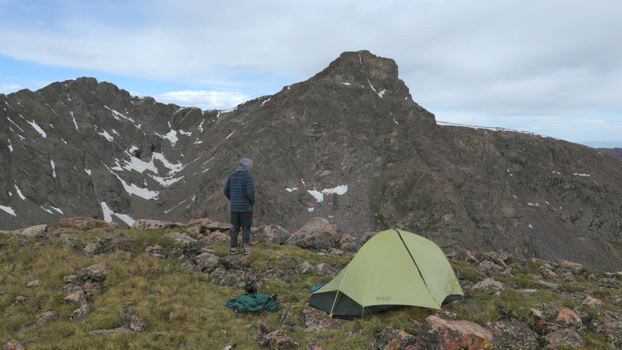 Stoked hiker backpacker camping tent Mount of the Holy Cross 14er peak wilderness aerial drone Colorado Rocky Mountains Halo Ridge Notch Mountain Sawatch Range landscape summer morning sunrise