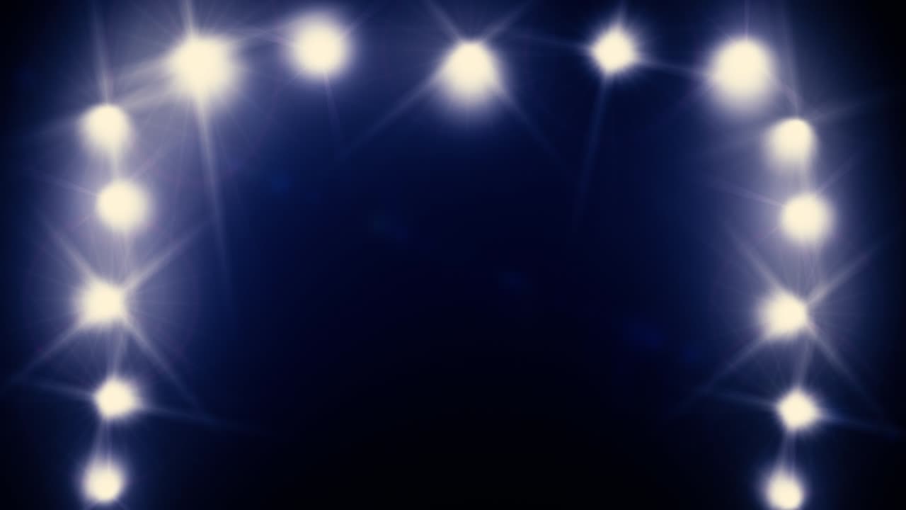 Night club lighting. Lighting with floodlights. Spotlights in the dark of the stage.