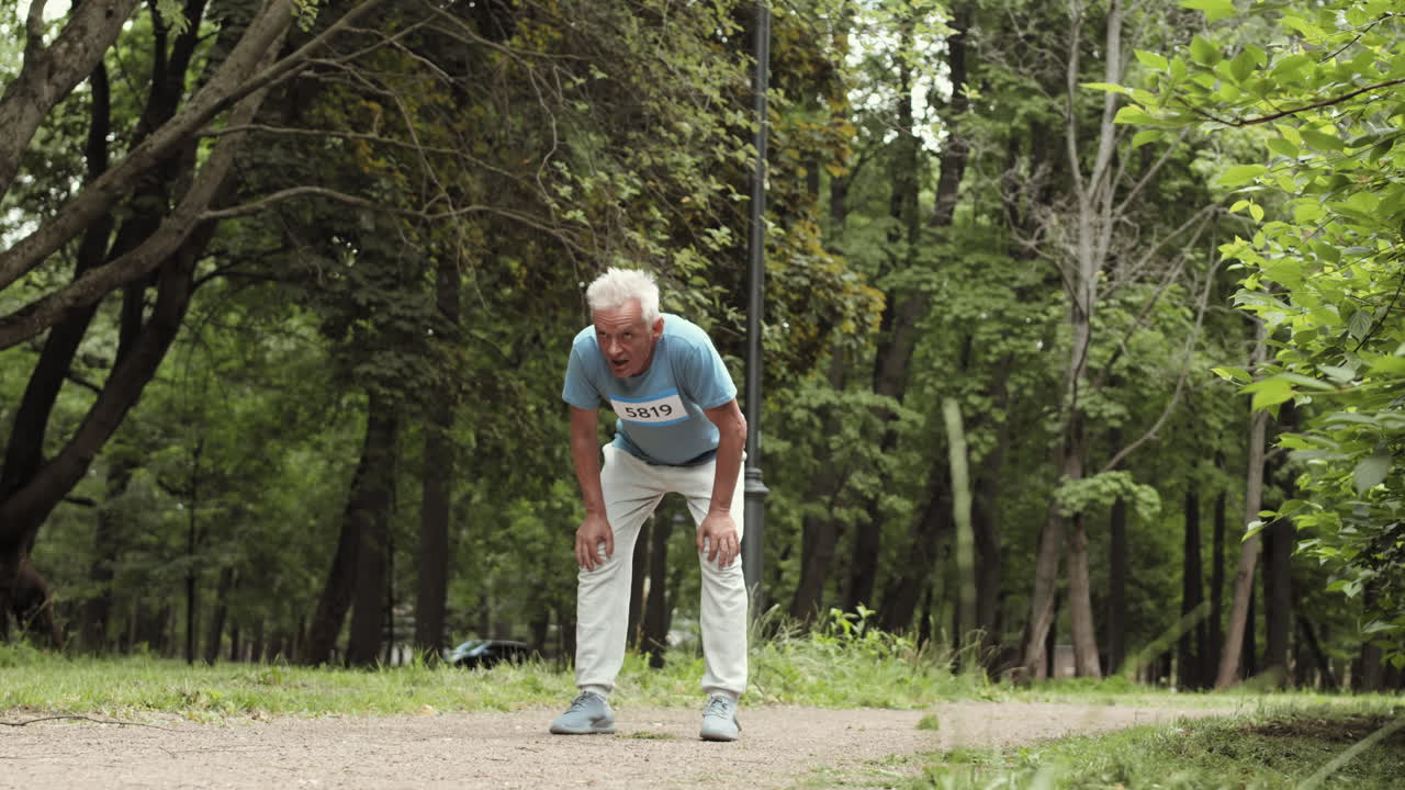 Senior Man Running and Resting in Park