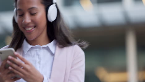 funky woman using a phone and listening to music