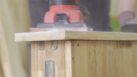 Front-of-Wooden-Drawer-Being-Sanded