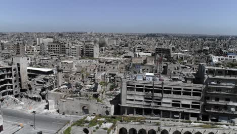 aleppo in syria 10 years after the civil war. we can see the city all over the horizon in aerial view with a drone 4k