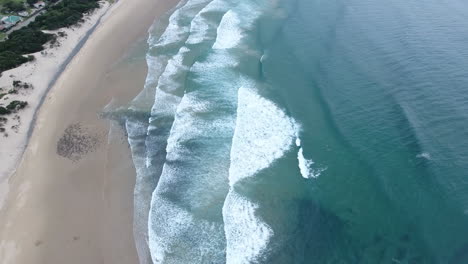 cinematic aerial flying along coast of east london south africa