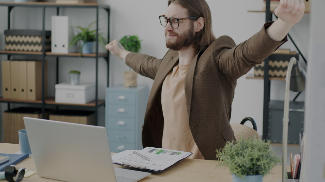 Businessman Relaxing and Stressed in Office