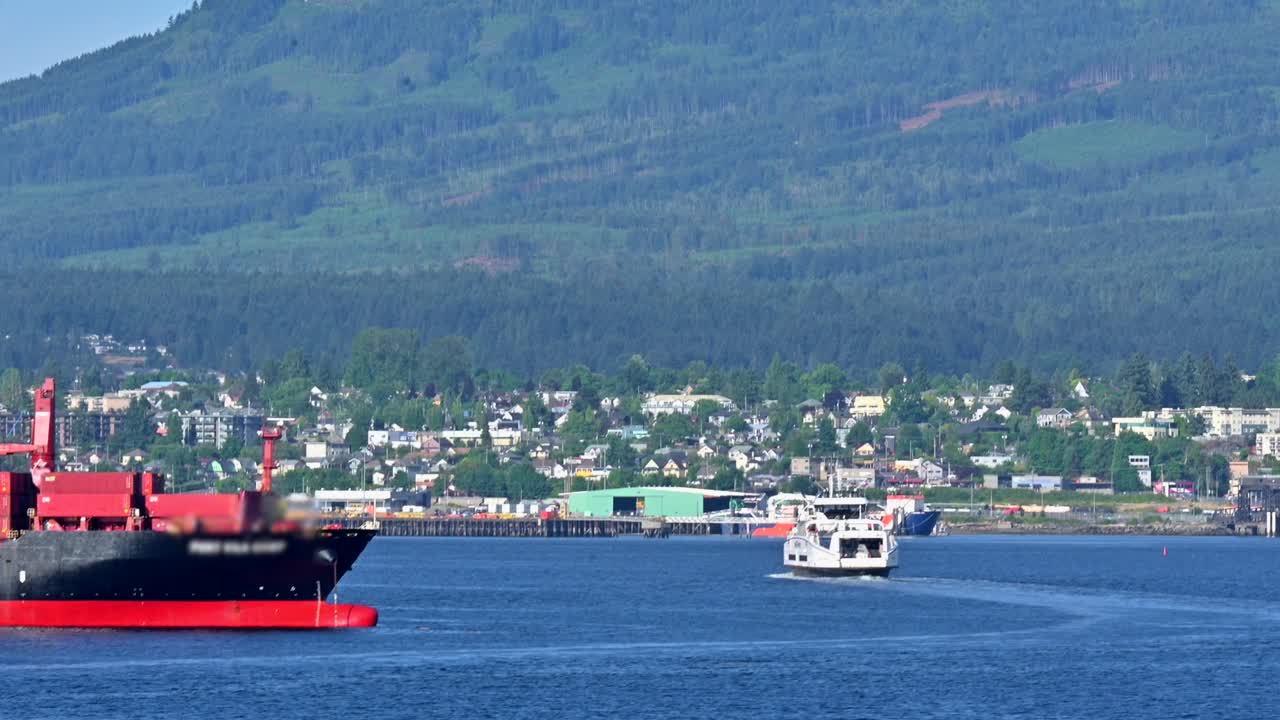 Industrial Hub: Duke Point B's Container Ships with Nanaimo's Cityscape