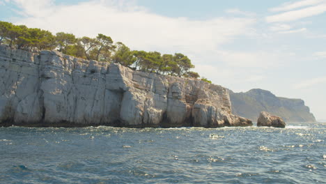 sailing around near the limestone cliffs of marseille in france