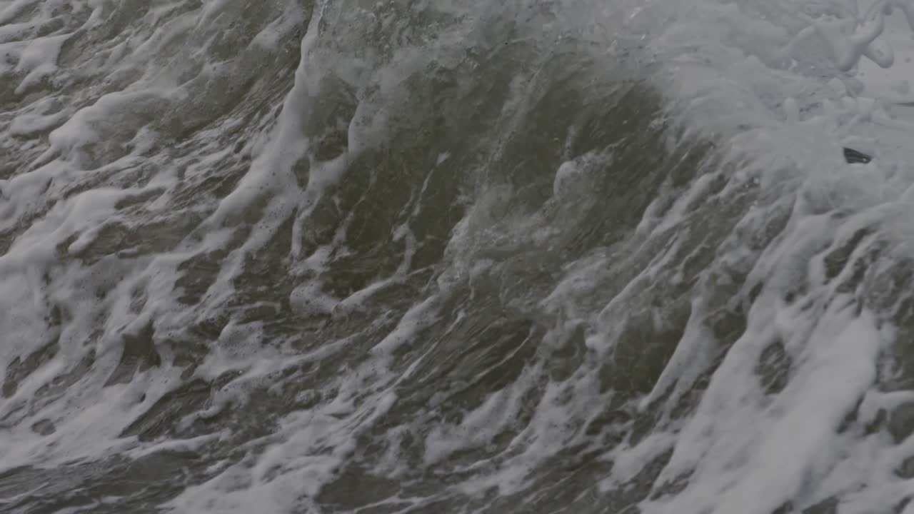 Ocean waves crashing in super slow motion on the beach at Domburg, Zeeland