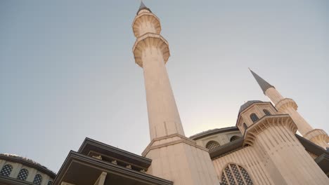 low angle view of a grand mosque with minarets