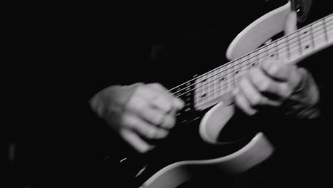 man playing electric guitar with black background stock video stock footage