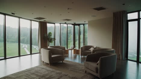 modern lounge area with panoramic garden view