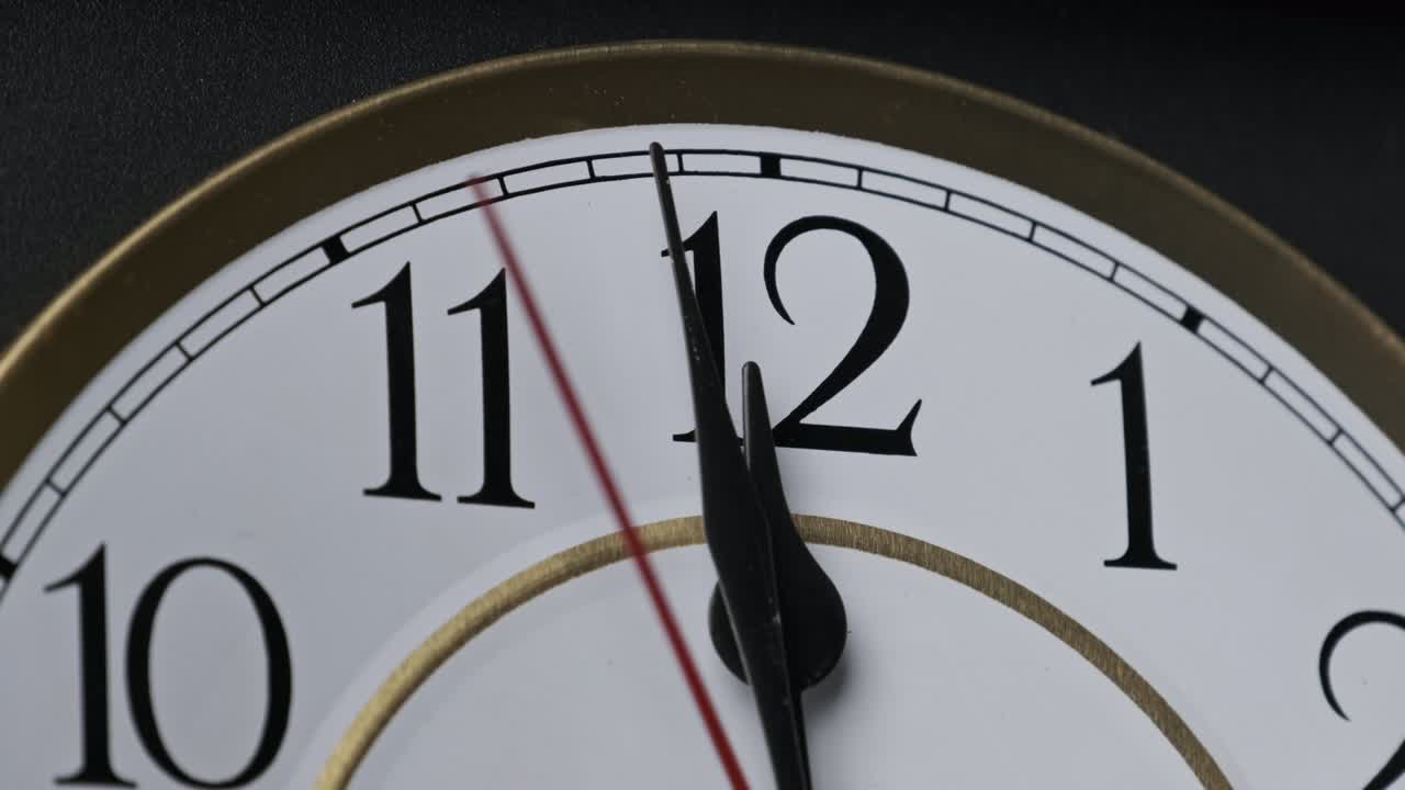 Old Retro Wall Clock with Moving Second Hand on White Circular Dial
