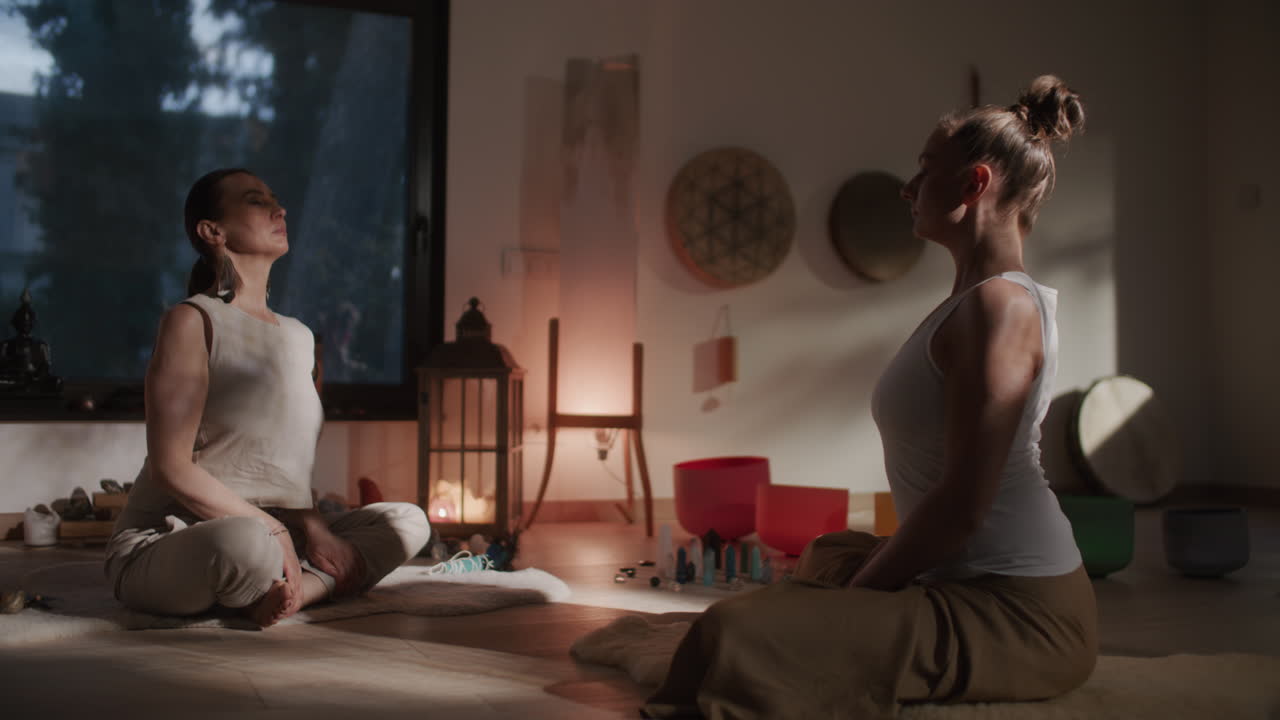Two women in meditation session