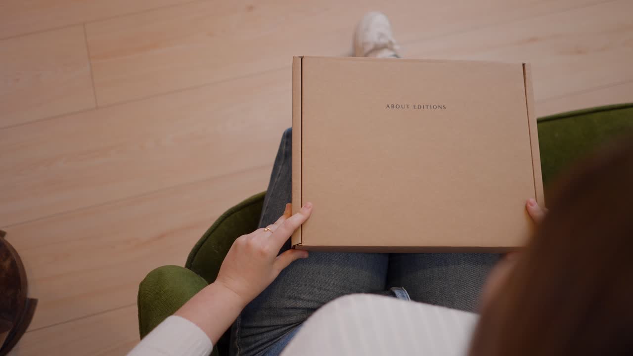 Person Unboxing a Package