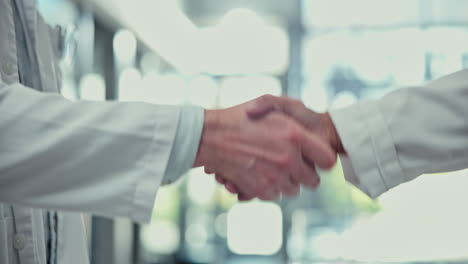 Doctor,-handshake-and-meeting-for-healthcare-deal