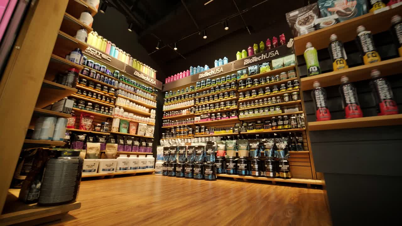 Sport nutrition store interior with large choice of nutritional supplements.