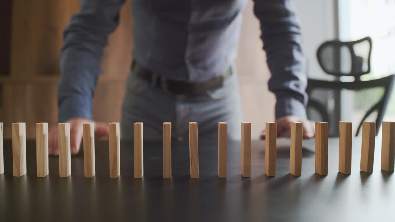 Concept For Domino Effect And Chain Reaction In Business