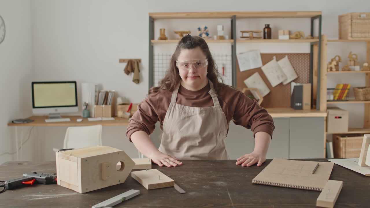 Woman with Down Syndrome Crafting in Workshop