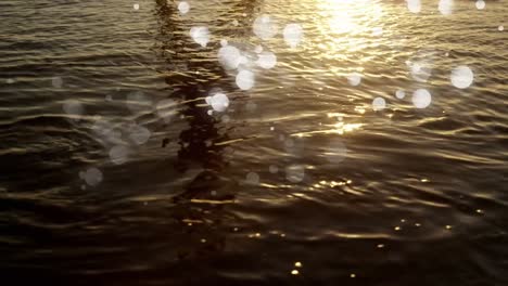 flowing water and bokeh lights