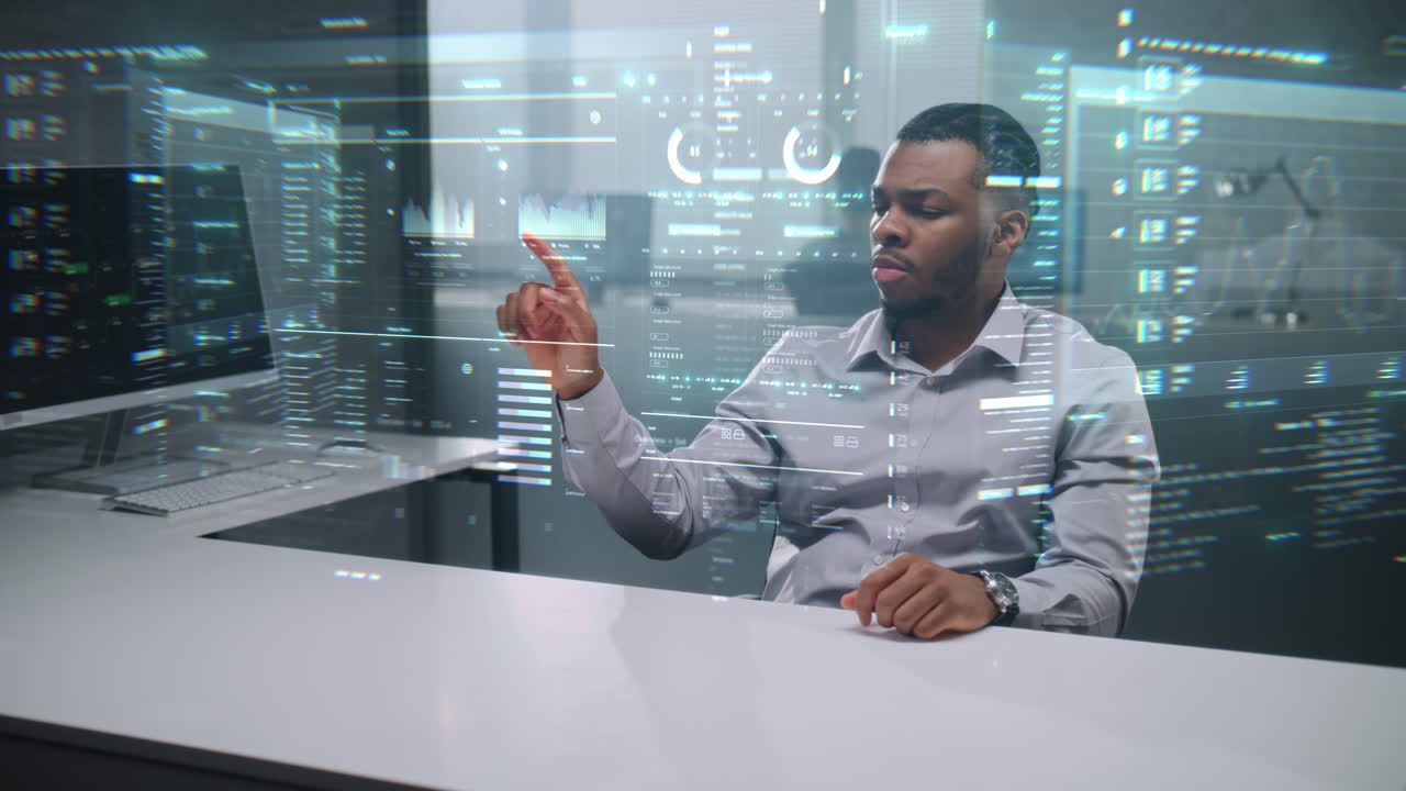 Man Working on a Virtual Interface in a Modern Office