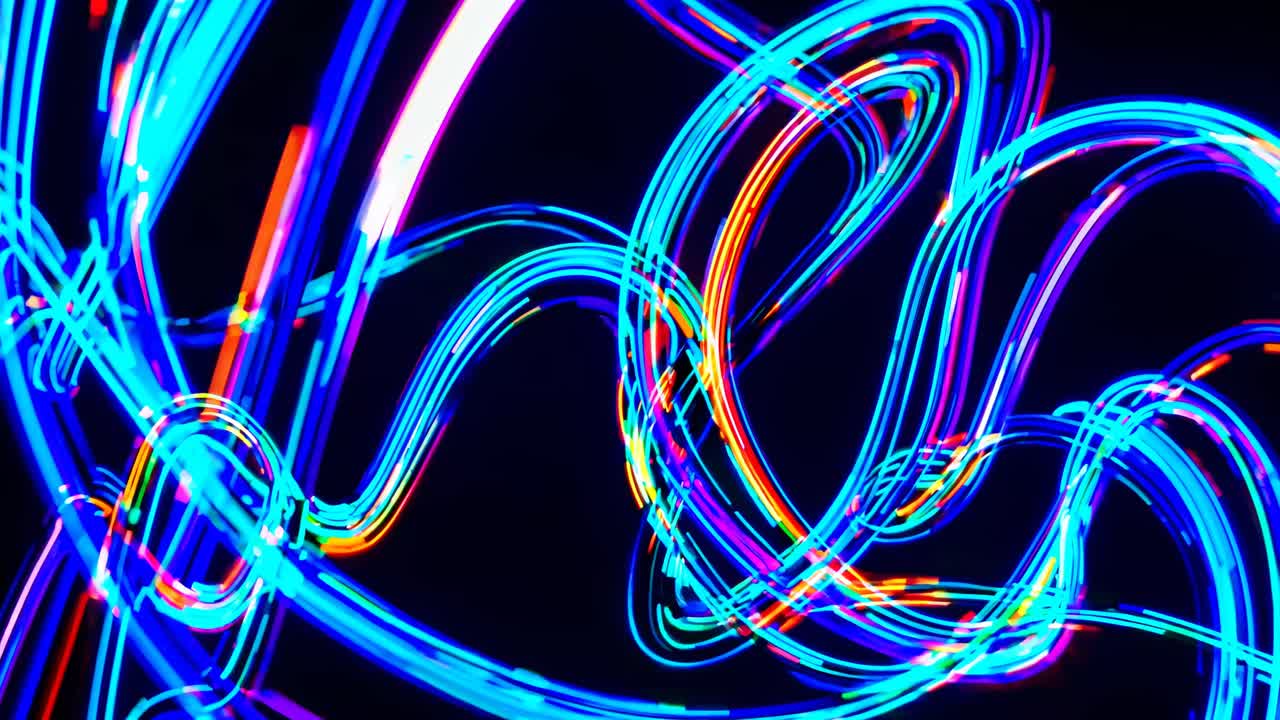 Dynamic long-exposure video capturing vibrant, swirling neon lights against a dark background