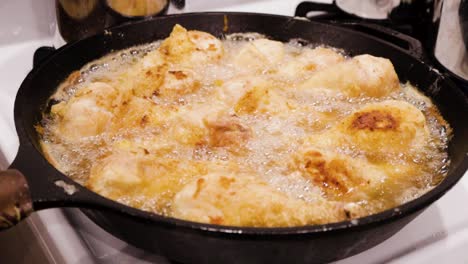 frying chicken drumsticks for dinner