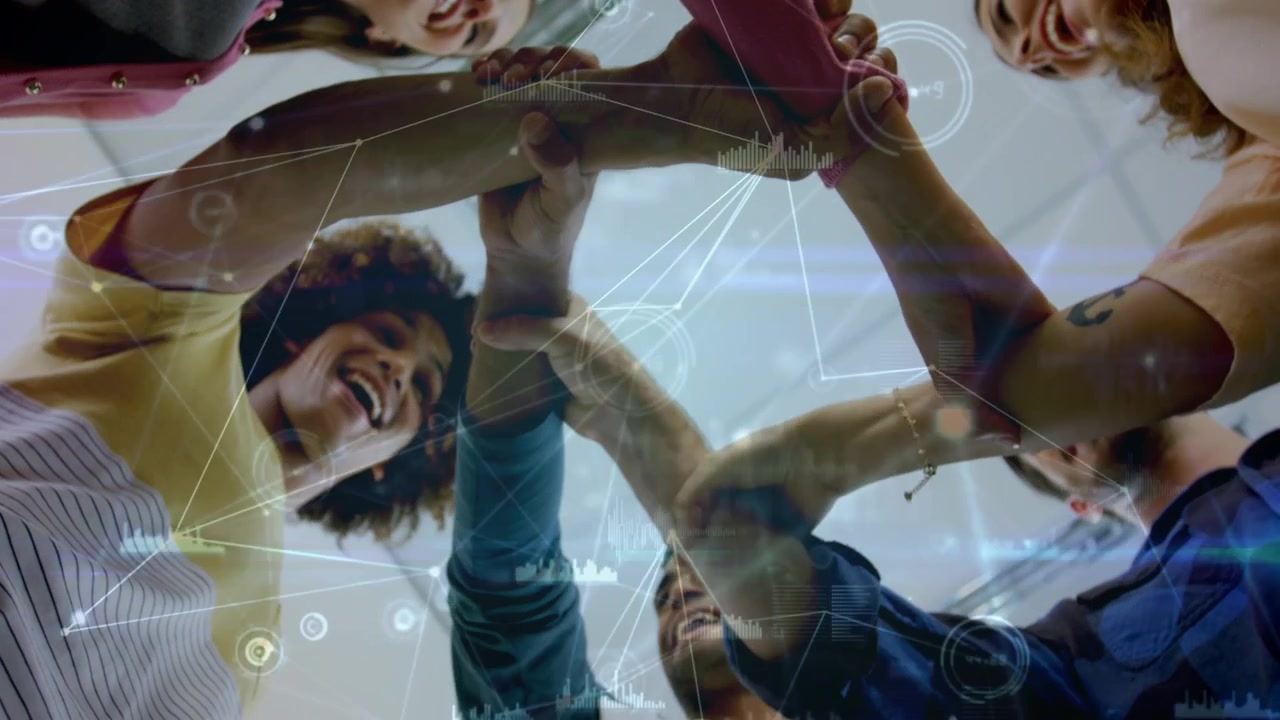 Diverse Team Joining Hands in Unity with Digital Network Overlay