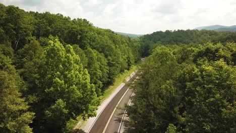 winding green mountain tennessee road near jellico